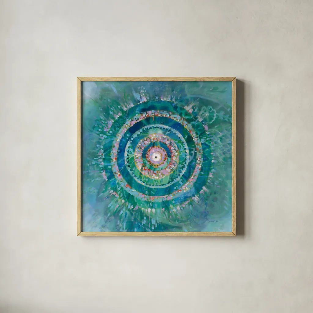 Ocean Mandala by Danhui Nai. Shown in a natural wood glass frame for a timeless modern aesthetic. Available as an archival giclee rolled canvas, fine art paper, or poster print. SKU 70573a.