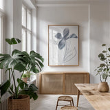 Paradise II Blue by Danhui Nai. shown as a print in a natural wood frame in a dining room. Available as a archival giclee rolled canvas, fine art paper, or poster print. SKU 86257h.