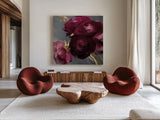 Plum Ranculus by Danhui Nai. Shown as extra-large giant wall art in a modern living room. Available as an archival giclee rolled canvas, fine art paper, or poster print. SKU 96458a.