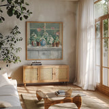 Purple Poppies Windowsill Sage by Danhui Nai. Shown in a natural wood frame in a cozy modern living room. Available as an archival giclee rolled canvas, fine art paper, or poster print. SKU 48710a.