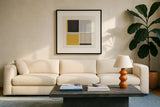 Quadrants Yellow by Danhui Nai. Displayed in a glass frame with matte in a clean modern living room. Available as an archival giclee rolled canvas, fine art paper, or poster print. SKU 88106a.