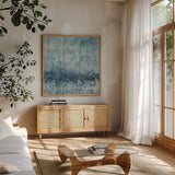 Rain Abstract IV Blue Silver by Danhui Nai. Shown in a natural wood frame in a cozy modern living room. Available as an archival giclee rolled canvas, fine art paper, or poster print. SKU 54050a.