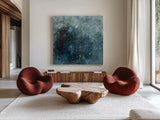Rain in Gray and Blue by Danhui Nai. Shown as extra-large giant wall art in a modern living room. Available as an archival giclee rolled canvas, fine art paper, or poster print. SKU 88192a.