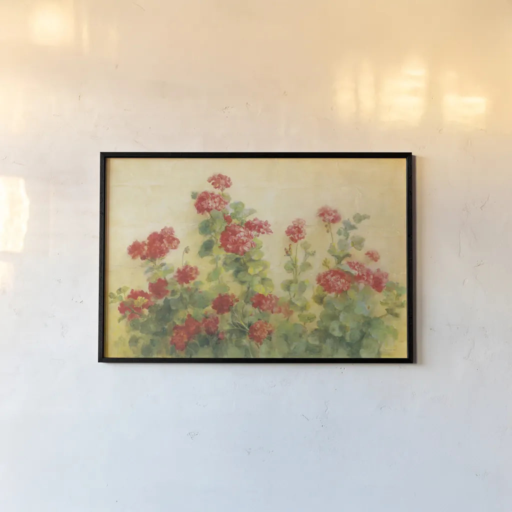Red Geraniums on White by Danhui Nai. shown as a paper print in a black flame. Available as a archival giclee rolled canvas, fine art paper, or poster print. SKU 5288i.