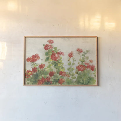 Red Geraniums on White v2 by Danhui Nai. shown as a paper print in a natural frame. Available as a archival giclee rolled canvas, fine art paper, or poster print. SKU 44813i.