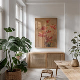 Red Magnolia by Danhui Nai. shown as a print in a natural wood frame in a dining room. Available as a archival giclee rolled canvas, fine art paper, or poster print. SKU 5427h.