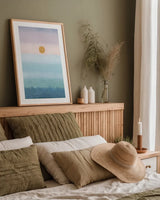 Rising and Setting by Danhui Nai. shown as a paper print in a natural frame. Available as a archival giclee rolled canvas, fine art paper, or poster print. SKU 66048h.