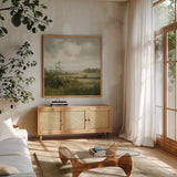 Rolling Fields by Danhui Nai. Shown in a natural wood frame in a cozy modern living room. Available as an archival giclee rolled canvas, fine art paper, or poster print. SKU 102489a.