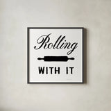 Rolling With It by Danhui Nai. Shown in a sleek black glass frame for a contemporary gallery look. Available as an archival giclee rolled canvas, fine art paper, or poster print. SKU 75935a.