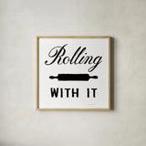 Rolling With It by Danhui Nai. Shown in a natural wood glass frame for a timeless modern aesthetic. Available as an archival giclee rolled canvas, fine art paper, or poster print. SKU 75935a.