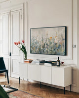 Rustic Garden Neutral by Danhui Nai. shown as a framed stretched canvas in a living room above a console. Available as a archival giclee rolled canvas, fine art paper, or poster print. SKU 77366i.