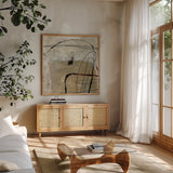 Sandy Shores by Danhui Nai. Shown in a natural wood frame in a cozy modern living room. Available as an archival giclee rolled canvas, fine art paper, or poster print. SKU 102471a.