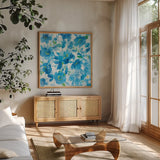Scattered Floral by Danhui Nai. Shown in a natural wood frame in a cozy modern living room. Available as an archival giclee rolled canvas, fine art paper, or poster print. SKU 58214a.