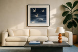Seagulls Over the Blue Sea by Danhui Nai. Displayed in a glass frame with matte in a clean modern living room. Available as an archival giclee rolled canvas, fine art paper, or poster print. SKU 102555a.