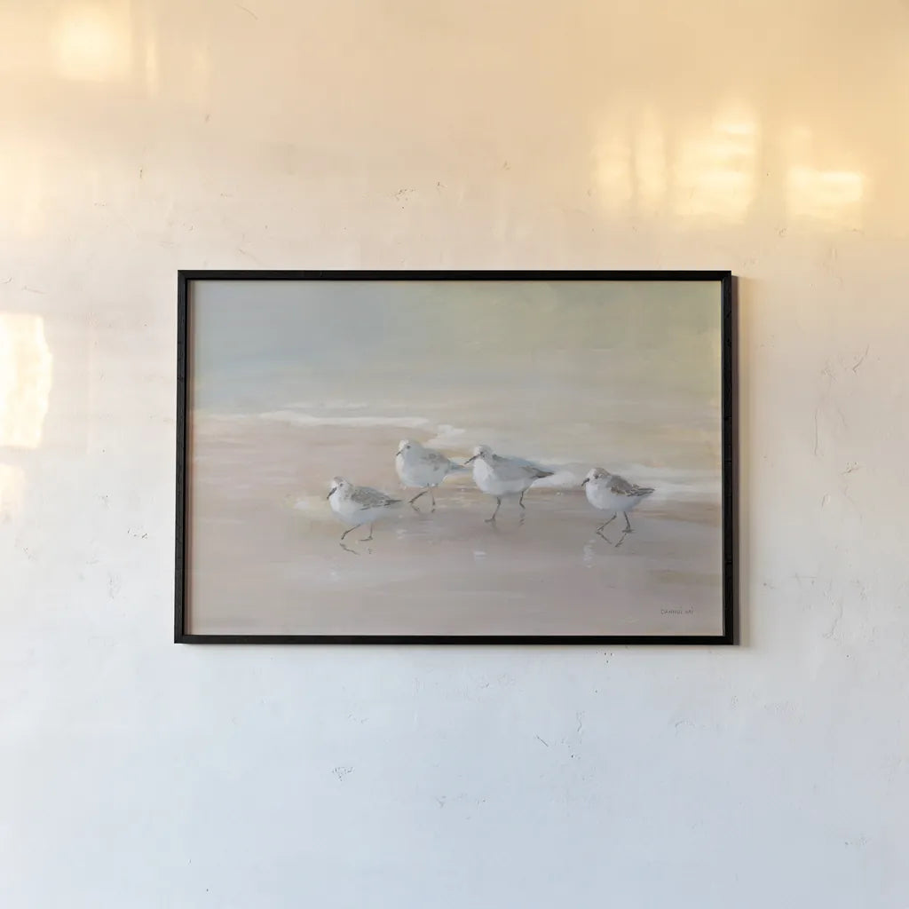 Shorebirds on the Sand I by Danhui Nai. shown as a paper print in a black flame. Available as a archival giclee rolled canvas, fine art paper, or poster print. SKU 81239i.