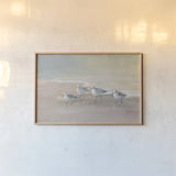 Shorebirds on the Sand I by Danhui Nai. shown as a paper print in a natural frame. Available as a archival giclee rolled canvas, fine art paper, or poster print. SKU 81239i.