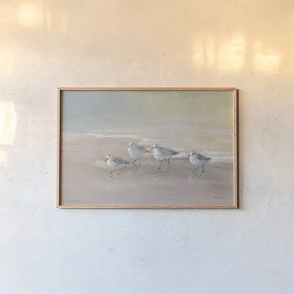 Shorebirds on the Sand I by Danhui Nai. shown as a paper print in a natural frame. Available as a archival giclee rolled canvas, fine art paper, or poster print. SKU 81239i.
