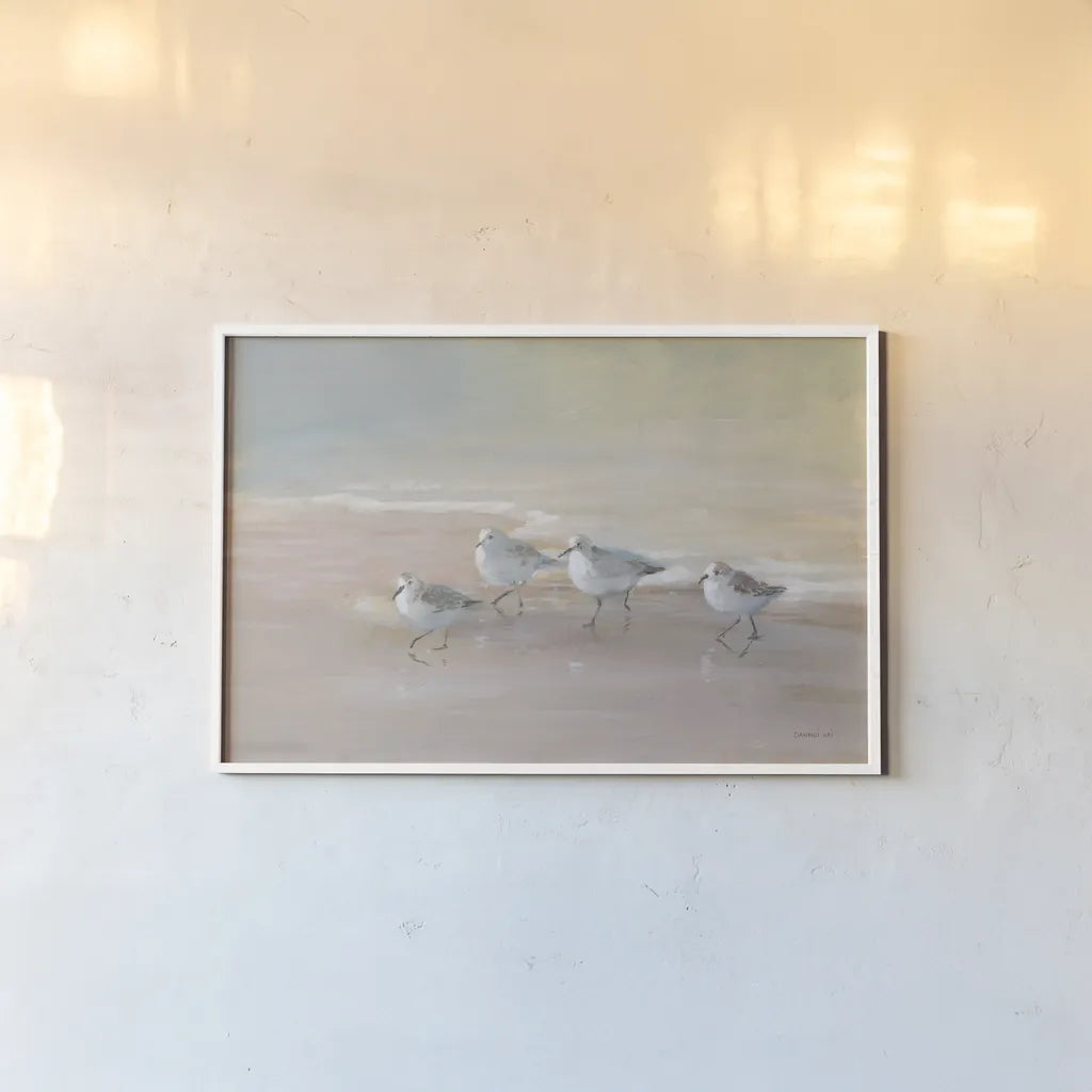 Shorebirds on the Sand I by Danhui Nai. shown as a paper print in a white frame. Available as a archival giclee rolled canvas, fine art paper, or poster print. SKU 81239i.