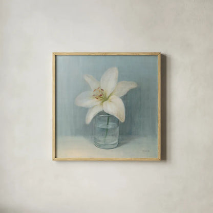 Single White Lily by Danhui Nai. Shown in a natural wood glass frame for a timeless modern aesthetic. Available as an archival giclee rolled canvas, fine art paper, or poster print. SKU 5184a.
