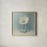 Single White Tulip by Danhui Nai. Shown in a natural wood glass frame for a timeless modern aesthetic. Available as an archival giclee rolled canvas, fine art paper, or poster print. SKU 5186a.