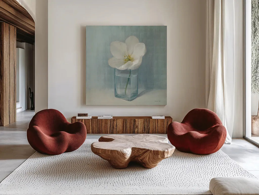 Single White Tulip by Danhui Nai. Shown as extra-large giant wall art in a modern living room. Available as an archival giclee rolled canvas, fine art paper, or poster print. SKU 5186a.