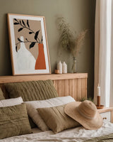 Slender Stems II Terracotta Crop by Danhui Nai. shown as a paper print in a natural frame. Available as a archival giclee rolled canvas, fine art paper, or poster print. SKU 80192h.