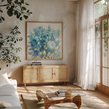 Soft Summer Blues by Danhui Nai. Shown in a natural wood frame in a cozy modern living room. Available as an archival giclee rolled canvas, fine art paper, or poster print. SKU 57587a.