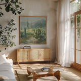 Sonoran Moment by Danhui Nai. Shown in a natural wood frame in a cozy modern living room. Available as an archival giclee rolled canvas, fine art paper, or poster print. SKU 81738a.