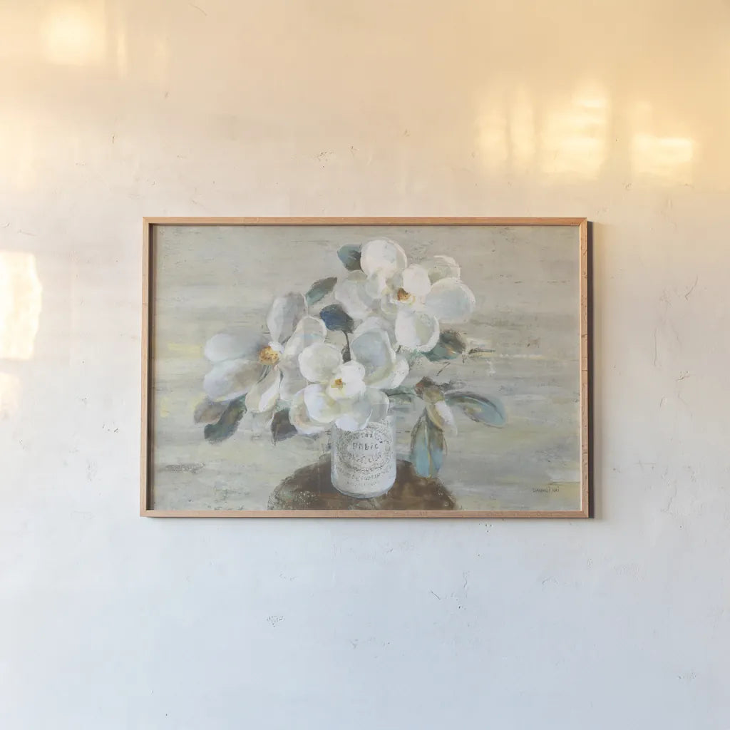 Sophies Magnolia Neutral by Danhui Nai. shown as a paper print in a natural frame. Available as a archival giclee rolled canvas, fine art paper, or poster print. SKU 76366i.