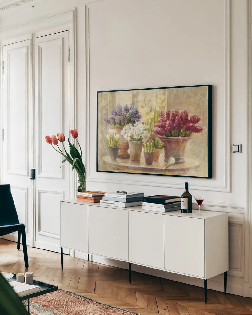 Spring Bulb Still Life by Danhui Nai. shown as a framed stretched canvas in a living room above a console. Available as a archival giclee rolled canvas, fine art paper, or poster print. SKU 5443i.