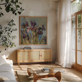 Spring Iris I by Danhui Nai. Shown in a natural wood frame in a cozy modern living room. Available as an archival giclee rolled canvas, fine art paper, or poster print. SKU 29774a.