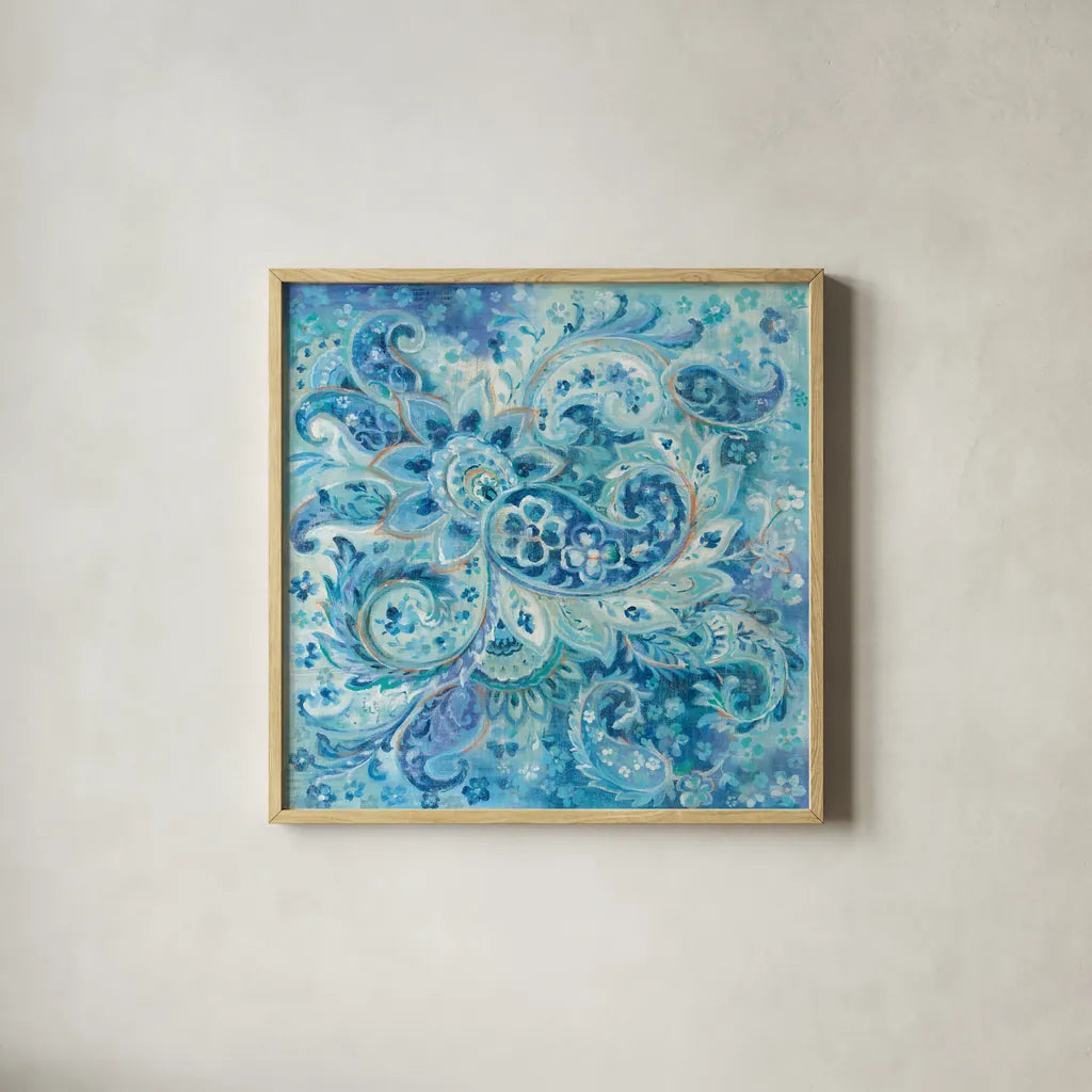 Surat Paisley by Danhui Nai. Shown in a natural wood glass frame for a timeless modern aesthetic. Available as an archival giclee rolled canvas, fine art paper, or poster print. SKU 51899a.