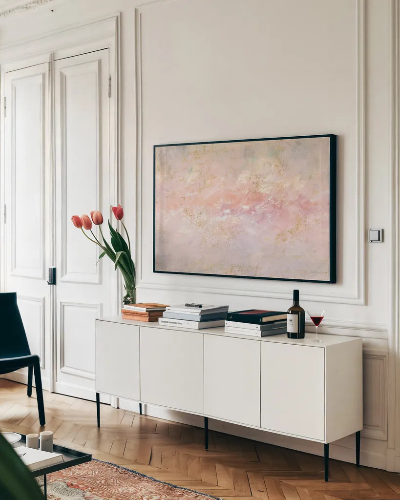 Through Fog Blush and Gold by Danhui Nai. shown as a framed stretched canvas in a living room above a console. Available as a archival giclee rolled canvas, fine art paper, or poster print. SKU 71365i.