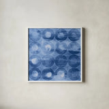 Touching Circles III Navy by Danhui Nai. Shown in a crisp white glass frame for a clean and minimalist style. Available as an archival giclee rolled canvas, fine art paper, or poster print. SKU 67900a.