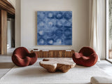 Touching Circles III Navy by Danhui Nai. Shown as extra-large giant wall art in a modern living room. Available as an archival giclee rolled canvas, fine art paper, or poster print. SKU 67900a.