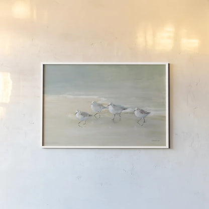 Tranquil Shorebirds on the Sand I by Danhui Nai. shown as a paper print in a white frame. Available as a archival giclee rolled canvas, fine art paper, or poster print. SKU 85290i.