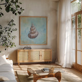Treasures from the Sea II Watercolor by Danhui Nai. Shown in a natural wood frame in a cozy modern living room. Available as an archival giclee rolled canvas, fine art paper, or poster print. SKU 26758a.