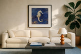 Treasures from the Sea Indigo I by Danhui Nai. Displayed in a glass frame with matte in a clean modern living room. Available as an archival giclee rolled canvas, fine art paper, or poster print. SKU 20048a.