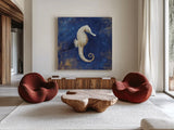 Treasures from the Sea Indigo I by Danhui Nai. Shown as extra-large giant wall art in a modern living room. Available as an archival giclee rolled canvas, fine art paper, or poster print. SKU 20048a.