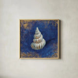 Treasures from the Sea Indigo II by Danhui Nai. Shown in a natural wood glass frame for a timeless modern aesthetic. Available as an archival giclee rolled canvas, fine art paper, or poster print. SKU 20049a.