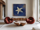 Treasures from the Sea Indigo IV by Danhui Nai. Shown as extra-large giant wall art in a modern living room. Available as an archival giclee rolled canvas, fine art paper, or poster print. SKU 20051a.