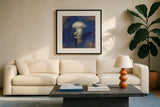 Treasures from the Sea Indigo VI by Danhui Nai. Displayed in a glass frame with matte in a clean modern living room. Available as an archival giclee rolled canvas, fine art paper, or poster print. SKU 20053a.