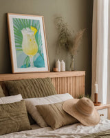 Tropical Cocktails I by Danhui Nai. shown as a paper print in a natural frame. Available as a archival giclee rolled canvas, fine art paper, or poster print. SKU 92426h.