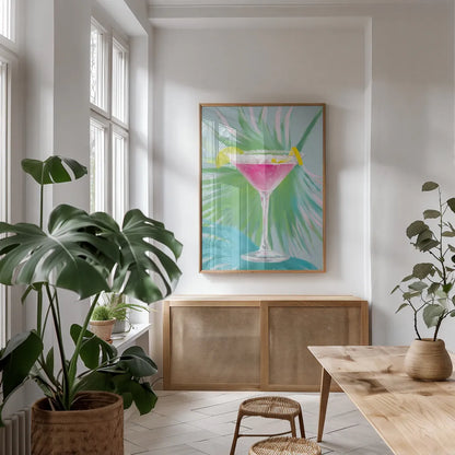 Tropical Cocktails II by Danhui Nai. shown as a print in a natural wood frame in a dining room. Available as a archival giclee rolled canvas, fine art paper, or poster print. SKU 92427h.