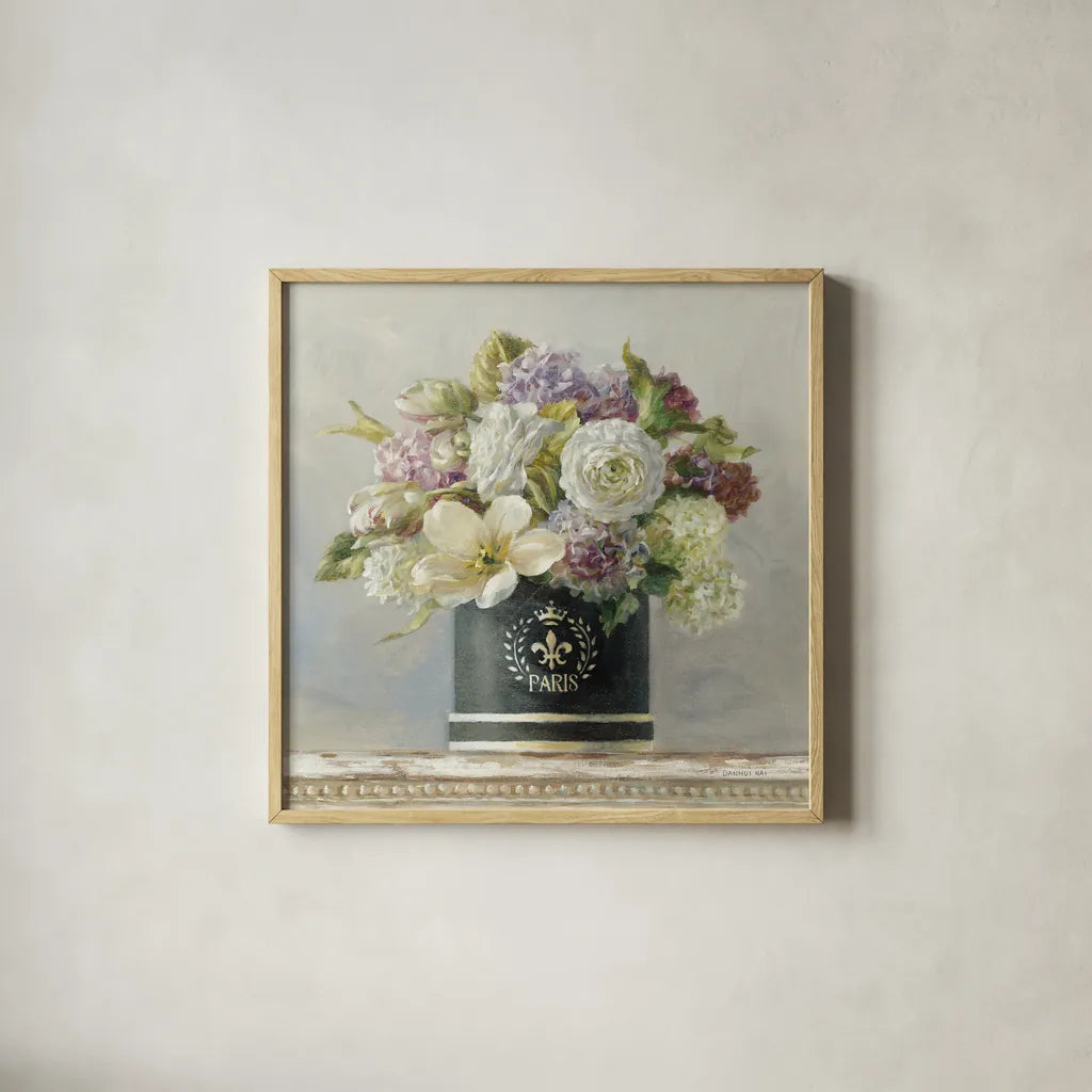 Tulips in Black and White Hatbox by Danhui Nai. Shown in a natural wood glass frame for a timeless modern aesthetic. Available as an archival giclee rolled canvas, fine art paper, or poster print. SKU 10262a.