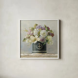 Tulips in Black and White Hatbox by Danhui Nai. Shown in a crisp white glass frame for a clean and minimalist style. Available as an archival giclee rolled canvas, fine art paper, or poster print. SKU 10262a.