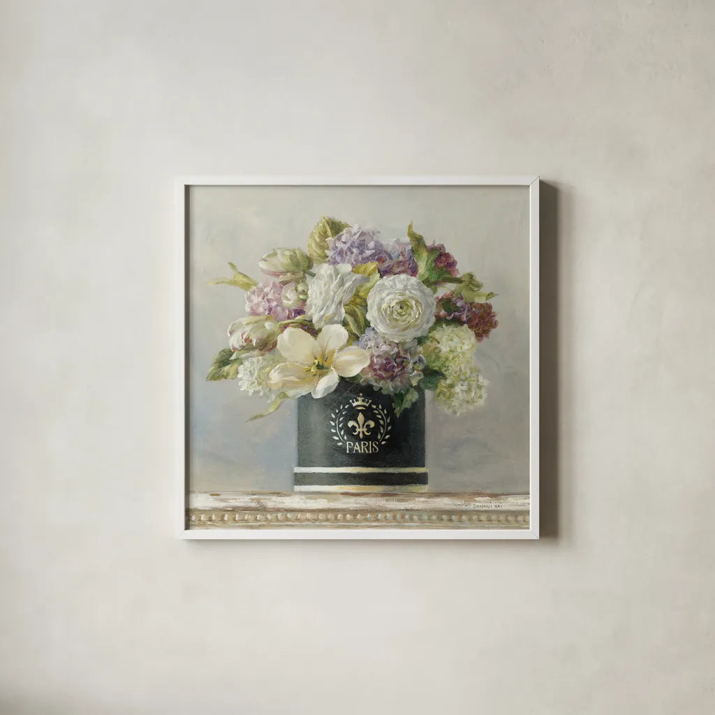Tulips in Black and White Hatbox by Danhui Nai. Shown in a crisp white glass frame for a clean and minimalist style. Available as an archival giclee rolled canvas, fine art paper, or poster print. SKU 10262a.