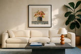 Tulips in Teal and Gold Hatbox on Linen by Danhui Nai. Displayed in a glass frame with matte in a clean modern living room. Available as an archival giclee rolled canvas, fine art paper, or poster print. SKU 30987a.