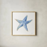 Undersea Starfish by Danhui Nai. Shown in a natural wood glass frame for a timeless modern aesthetic. Available as an archival giclee rolled canvas, fine art paper, or poster print. SKU 83139a.