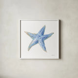 Undersea Starfish by Danhui Nai. Shown in a crisp white glass frame for a clean and minimalist style. Available as an archival giclee rolled canvas, fine art paper, or poster print. SKU 83139a.